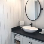 Small bathroom vanity with bowl sink and open shelves
